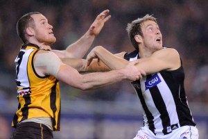 Collingwood's Ben Reid battles with Hawthorn's Jarryd Roughead. Reid will be needed in the forward line this time.